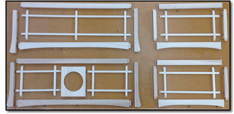 Pieces of kitchen sink ceiling light prior to assembly by Sam Davis.